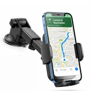 May include: Black car phone mount with a suction cup base. A smartphone is secured in the holder, displaying a map with directions from London to Manchester. The screen shows a travel time of 2 hours and 57 minutes.