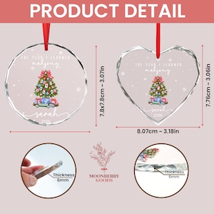 May include: Two clear glass ornaments, one circular and one heart-shaped, featuring a Christmas tree decorated with mahjong tiles, the text "THE YEAR I LEARNED mahjong", "sarah", and "2026". Dimensions are 7.8cm to 3.07in by 7.8cm to 3.07in, with 6mm thickness.