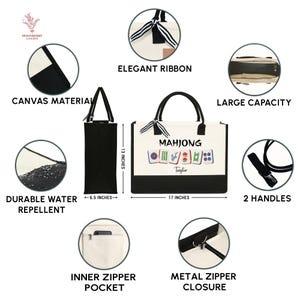 May include: A canvas tote bag with a black and white design. The bag features the word "MAHJONG" and a Mahjong tile graphic. It has a black bottom, handles, and an elegant ribbon. The bag is 17 inches wide, 13 inches high, and 6.5 inches deep.