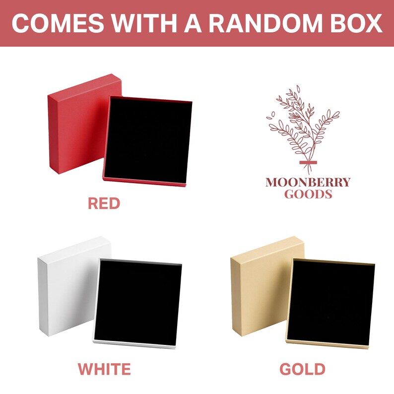 May include: Three square gift boxes with lids, each featuring a black interior. The boxes are available in red, white, and gold. The text "COMES WITH A RANDOM BOX" appears at the top, and the logo "MOONBERRY GOODS" is displayed with a floral graphic.