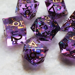 Strangelight, purple polyhedral sharp edge DnD gem dice holographic iridescent