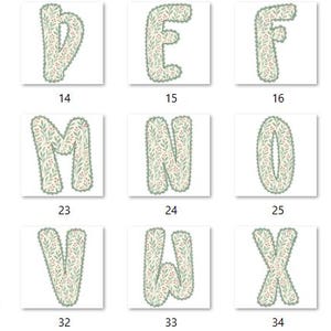 Pode incluir: Uma cole&ccedil;&atilde;o de letras do alfabeto, cada uma em um quadrado diferente. As letras est&atilde;o em uma fonte de bolhas, com um padr&atilde;o salpicado verde claro e branco. Os n&uacute;meros 11-36 est&atilde;o abaixo de cada letra.