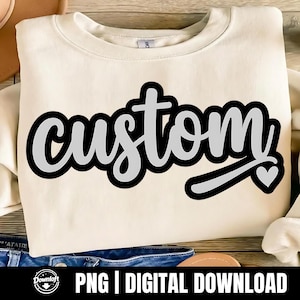 May include: Cream-colored sweatshirt with the word "custom" in a stylized, cursive font. The word is outlined in black with a light gray fill and a small heart graphic. The bottom of the image includes the text "PNG | DIGITAL DOWNLOAD".
