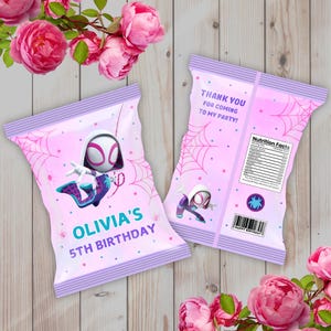 May include: Two pink party favor bags with a Spider-Gwen design. One bag features the text "OLIVIA'S 5TH BIRTHDAY". The other bag has the text "THANK YOU FOR COMING TO MY PARTY!" and a nutrition facts label. Pink flowers surround the bags.