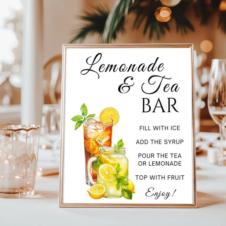 May include: A framed sign with the words "Lemonade & Tea BAR" in elegant script. The sign features watercolor illustrations of iced tea and lemonade, with instructions: "Fill with ice, add the syrup, pour the tea or lemonade, top with fruit, enjoy!"