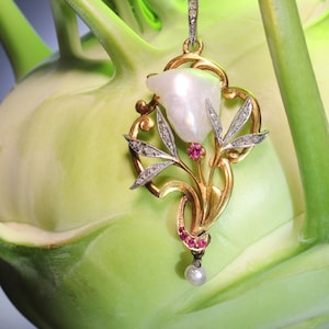 French Art Nouveau Pendant with a Big Mississippi Dog Tooth Pearl, Diamonds and Rubies, 1900s