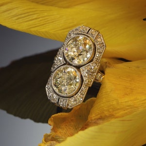 Art Deco engagement ring with two large lemon-chiffon colour brilliants