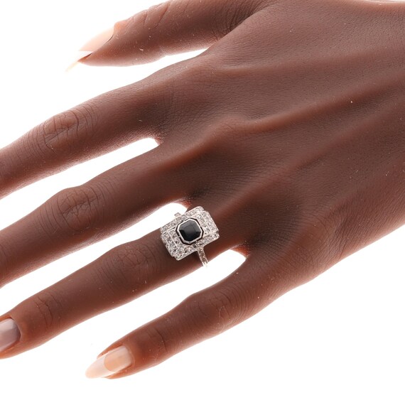 Circa 1930 Art Deco sapphire ring framed by fifty rose cut diamonds View 2