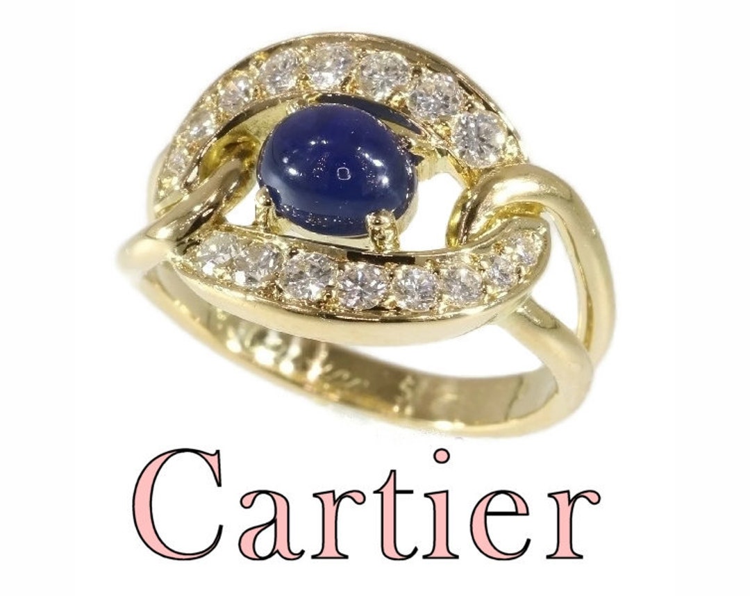 Anillo Cartier vintage de oro amarillo de 18 quilates con zafiro