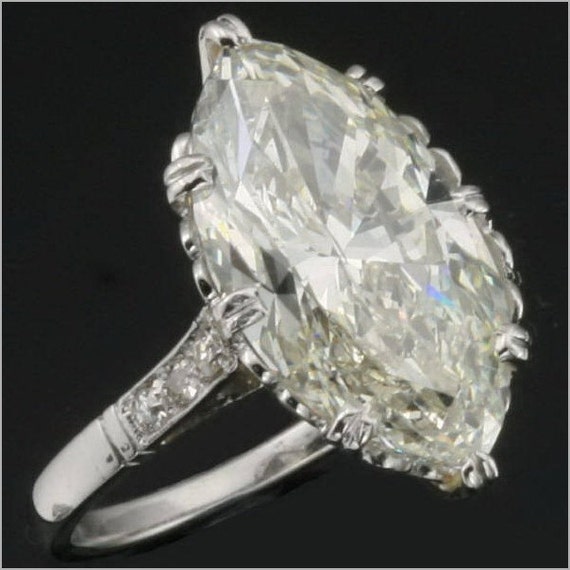 Items similar to Vintage marquise diamond engagement ring on Etsy