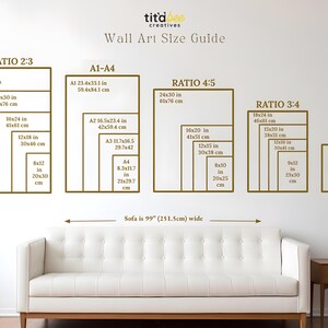May include: Wall art size guide with dimensions in inches and centimeters. Displays various aspect ratios, including 2:3, 4:5, and 3:4, with corresponding sizes. A white sofa is positioned below the guide, with a wooden side table.