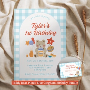 May include: A blue gingham birthday invitation with a teddy bear picnic theme. The invitation includes the text "Tyler's 1st Birthday" and event details. A matching thank you card is included. The invitation is decorated with illustrations of picnic items.