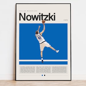 May include: A blue and white poster with a black frame featuring a basketball player in mid-air, shooting a basketball. The poster reads "Dallas Mavericks Nowitzki /1978".