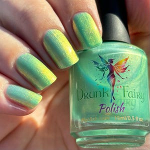 Lucky Clover | A Bright Shamrock Green Jelly Nail Polish with a Mixed Particle Size Aurora Shimmer