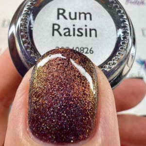 Rum Raisin | An Indigo Blue Jelly Base With an Orange to Gold Shimmer With Scattered Holo