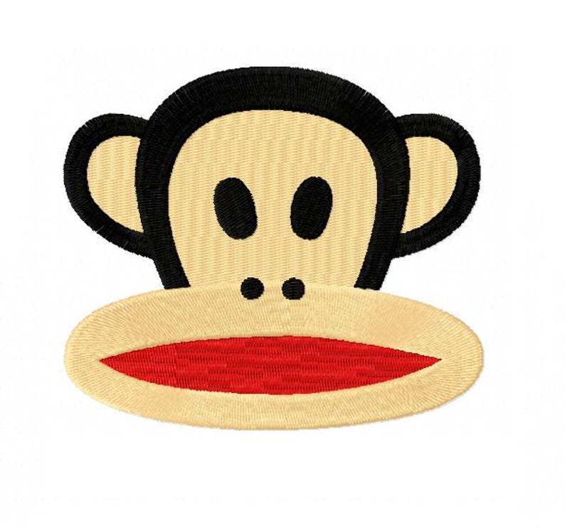 May include: Embroidered patch featuring a cartoon monkey face. The monkey has a tan face, black eyes, ears, and a red open mouth. The patch is designed to be sewn or ironed onto fabric.
