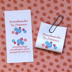personalised craft labels for handmade items. washable sew-in loop labels. multi-colour labels with a picture of colourful buttons, personalised with your own text.
