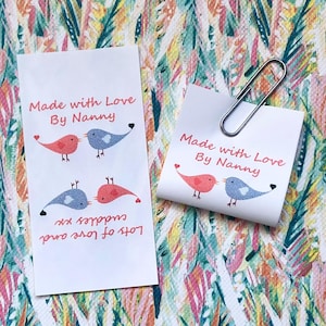 personalised craft labels for handmade items. washable sew-in loop labels. multi-colour labels with a picture of love birds, personalised with your own text.