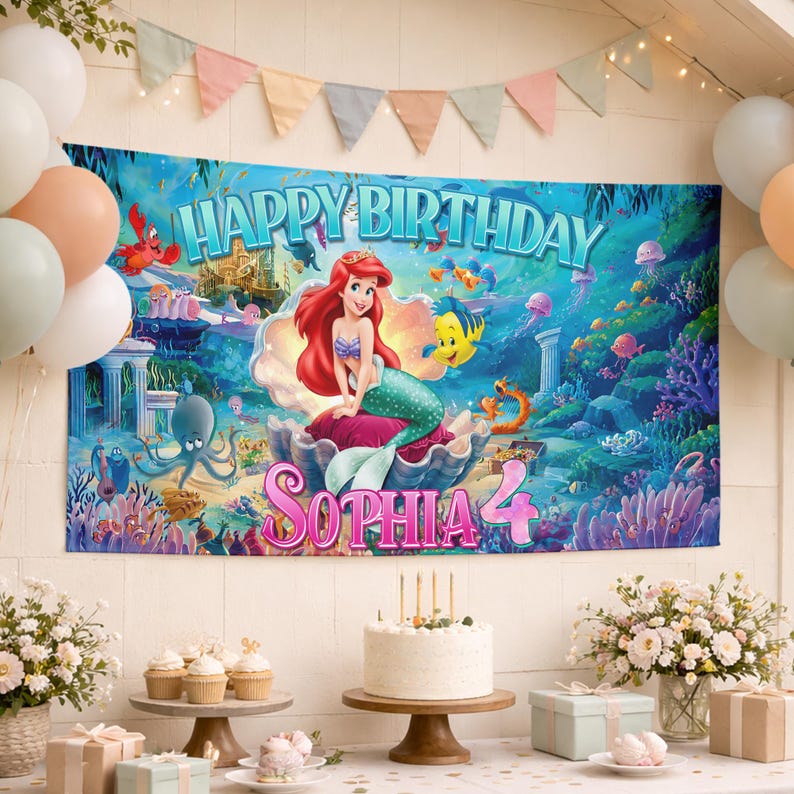 May include: A rectangular birthday banner featuring a colorful underwater scene with a mermaid character, a yellow fish, and an octopus. The text reads HAPPY BIRTHDAY and SOPHIA 4 in large, bold, blue and pink lettering against a vibrant ocean backdrop.