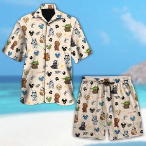 May include: A beige shirt and shorts set with a Star Wars theme. The pattern includes various characters, balloons, and stars. The shirt has a black collar and short sleeves. The shorts have a drawstring waist.