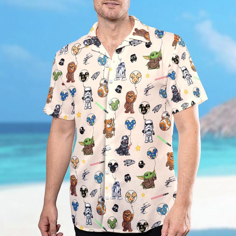 May include: A white ceramic mug with a black handle and the text "But First, Coffee" in a bold, black font. The mug is set against a blurred background, suggesting a cosy setting.