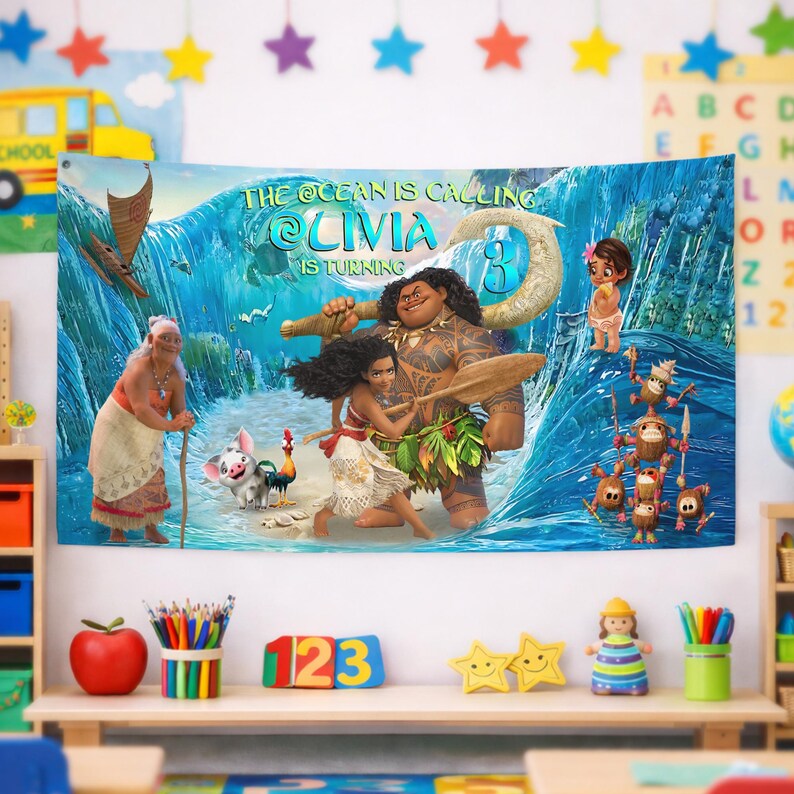 May include: A rectangular fabric banner featuring a Moana-themed birthday design with a large ocean wave background. The text reads THE OCEAN IS CALLING OLIVIA IS TURNING 3. Characters include Moana, Maui, Gramma Tala, Pua, Heihei, and Kakamora.