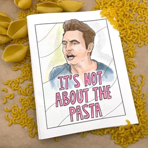 May include: A white book with a cartoon illustration of a man with the text "IT'S NOT ABOUT THE PASTA" in pink. The book is surrounded by uncooked pasta shells and elbow macaroni.