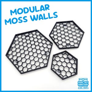May include: Three black hexagonal modular moss wall panels with a honeycomb design. Each panel has suction cups on the back for easy mounting.