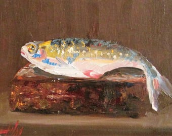 Original fish on a brick still life oil painting.