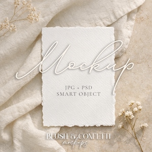 May include: A white textured paper mockup with the word "Mockup" in a cursive font. The paper has a torn edge and is set on a beige linen cloth and a textured surface. The text "JPG + PSD SMART OBJECT" is also visible.