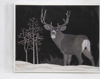 May include: A framed artwork featuring a detailed illustration of a deer with large antlers, set against a dark background. White birch trees with yellow accents stand to the left, with a snowy ground.