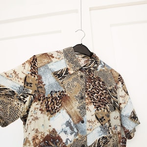 Animal print blouse women size L, Vintage short sleeve button down silky shirt, abstract collared top with side slits