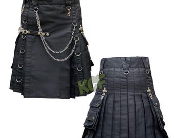 Könnte beinhalten: Schwarzer Kilt mit silberner Kette und Hardware-Details. Der Kilt hat Taschen, D-Ringe und ein plissiertes Design. Der Kilt ist aus einem robusten Material gefertigt und hat einen klassischen, aber kantigen Stil.