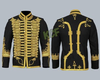 May include: A black jacket with gold trim and buttons. The jacket has a stand-up collar and long sleeves. The trim is intricate and features a repeating pattern.