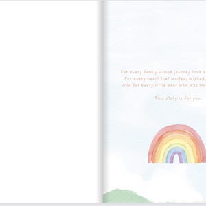 May include: A watercolor illustration of a rainbow with a star in the top right corner. The text reads: "For every family whose journey took a little longer. For every heart that waited, wished, and hoped. And for every little bear who was worth the wait. This story is for you."