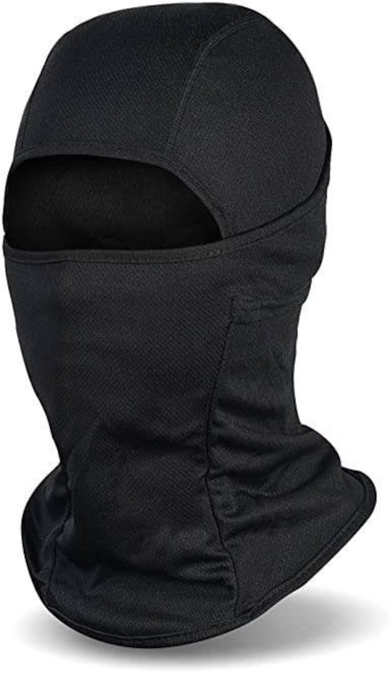 May include: A solid black balaclava made of a lightweight, breathable, moisture-wicking fabric. This full-face headgear features a single large eye opening and extends down to cover the neck and upper chest area with a contoured, fitted design.