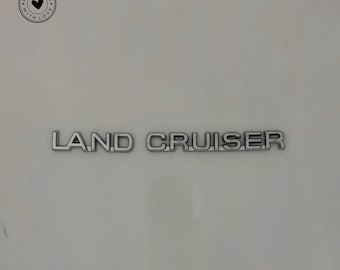 Emblema para el maletero del Toyota Land Cruiser (2002-2009): Insignia cromada para el portón trasero