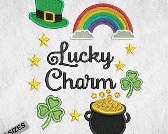 May include: Embroidery design for St. Patrick's Day featuring a green leprechaun hat, a rainbow, a pot of gold, shamrocks, and the text "Lucky Charm".