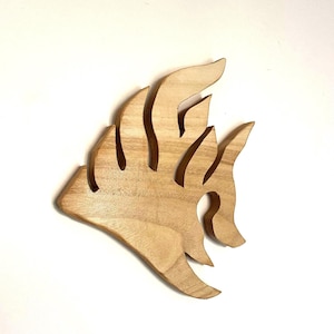 Decorative fish carved from paulownia wood – modern and minimalist design