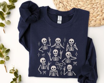 Playful Skeleton Grid sweatshirt | Halloween skeletons, spooky bones design