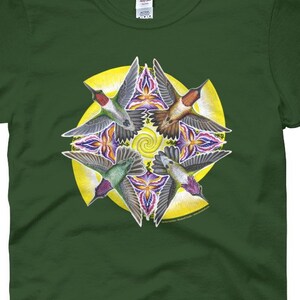 May include: A green t-shirt featuring a colourful design of five hummingbirds in a circle. The hummingbirds are flying in different directions and have purple, green and yellow accents.