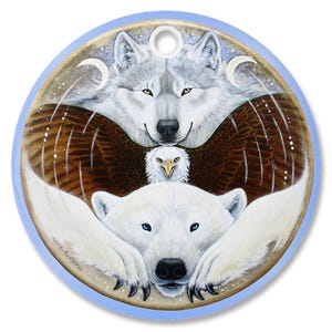 May include: A round, wooden ornament with a blue border. The ornament features a white wolf, a brown eagle, and a white polar bear. The wolf is at the top, the eagle is in the middle, and the polar bear is at the bottom. The animals are all facing forward and have their eyes open. The background is a dark blue with white stars.