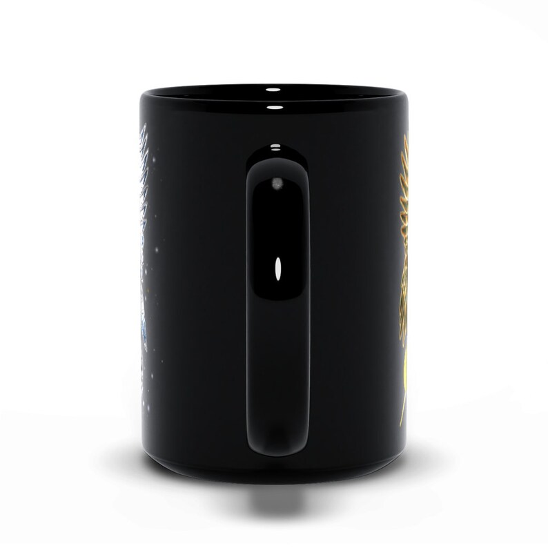 May include: Black ceramic coffee mug with a gold and blue design. The design features a stylized sun and moon with stars.