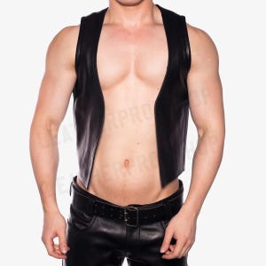 May include: A black leather vest with a deep V-neckline. The vest is open in the front and has a simple design.
