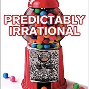 May include: A red gumball machine filled with colourful gumballs, with the title "Predictably Irrational" in large red letters. The book's author, Dan Ariely, is listed at the top. The text at the bottom reads "The Hidden Forces that Shape Our Decisions."