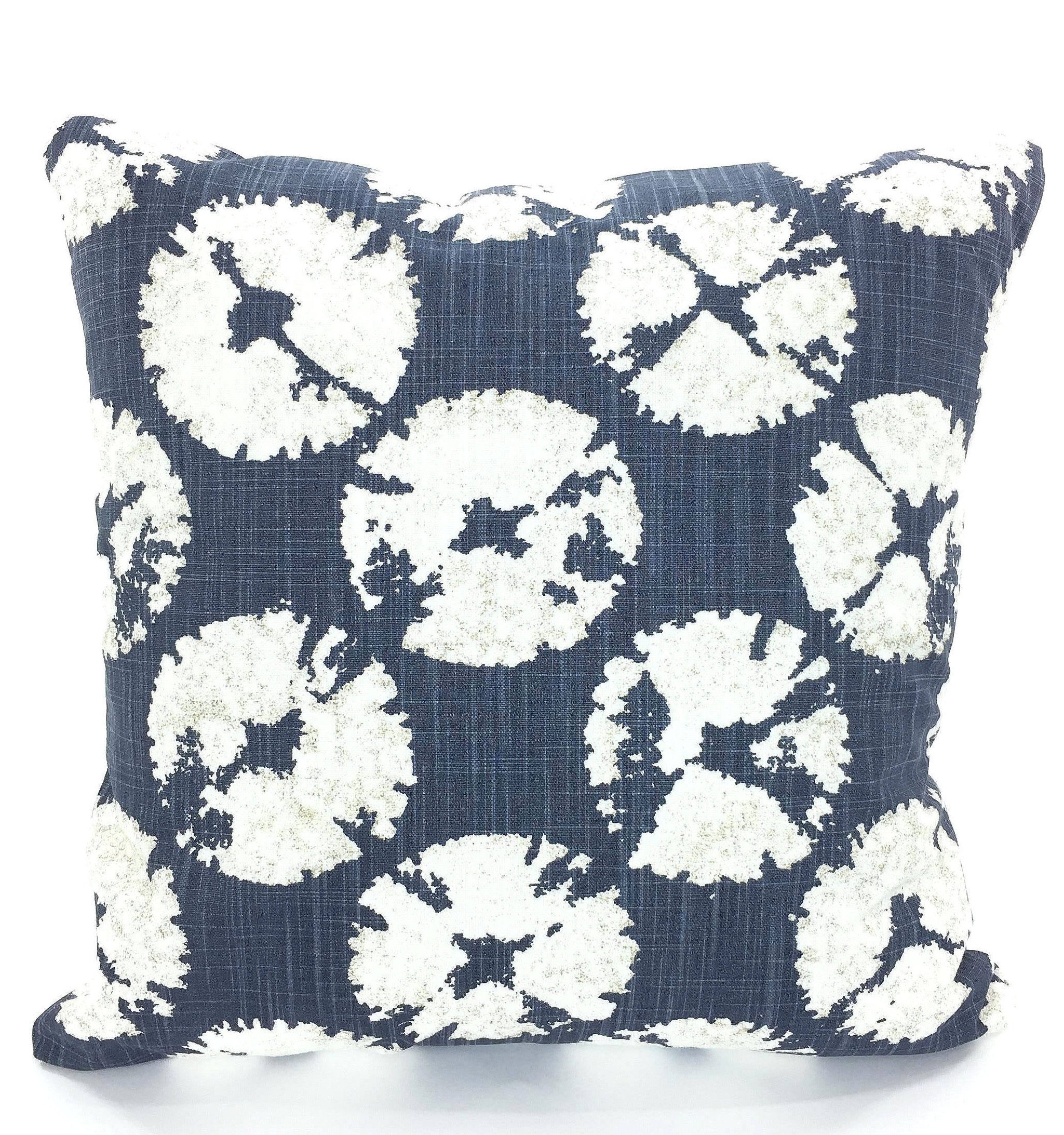 white decorative bed pillows