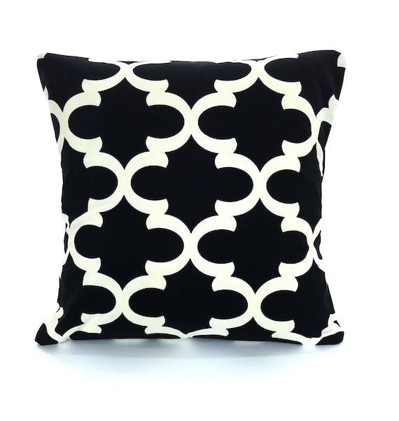 black and cream decorative pillows