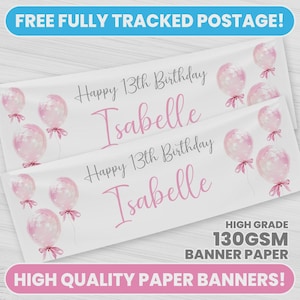 May include: White banner with pink text saying "Happy 13th Birthday Isabelle". The banner features pink balloons. The text "HIGH QUALITY PAPER BANNERS!" is at the bottom. The banner is made of 130gsm paper.