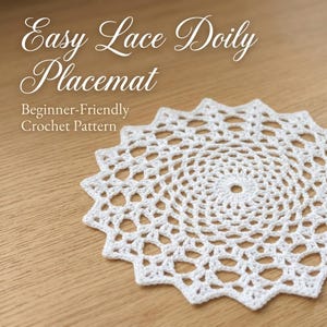 May include: A white circular crochet doily placemat with an intricate openwork lace pattern. The text "Easy Lace Doily Placemat" and "Beginner-Friendly Crochet Pattern" is printed in white script and sans-serif font above the doily.