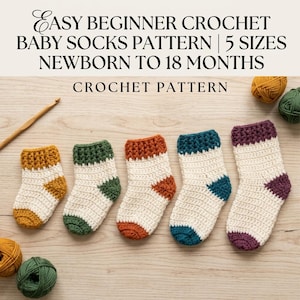May include: A crochet pattern for baby socks in five sizes from newborn to 18 months, featuring text that reads EASY BEGINNER CROCHET BABY SOCKS PATTERN. Five crocheted socks in cream with mustard, green, orange, teal, and purple accents are displayed.